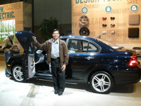 Lloyd Tran with Coda Electric Car